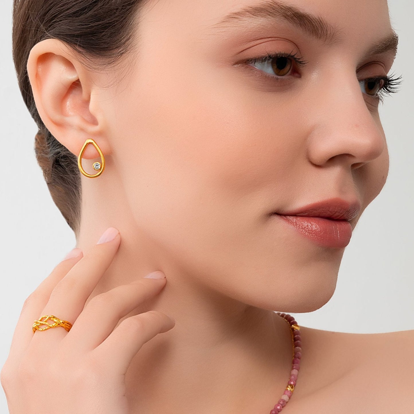 Gold Tear Drop Stud Earrings with Cubic Zirconia